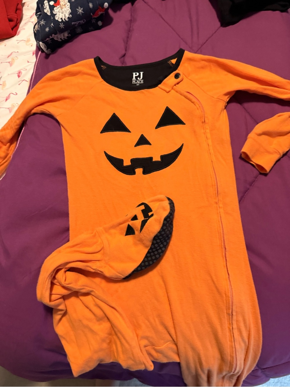 Place Orange and Black Kids' Halloween pajamas